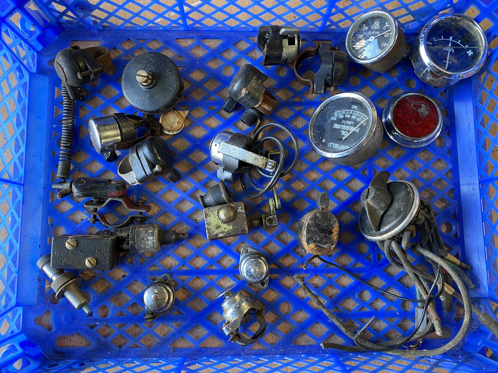 Three gauges and handlebar electrical switches.