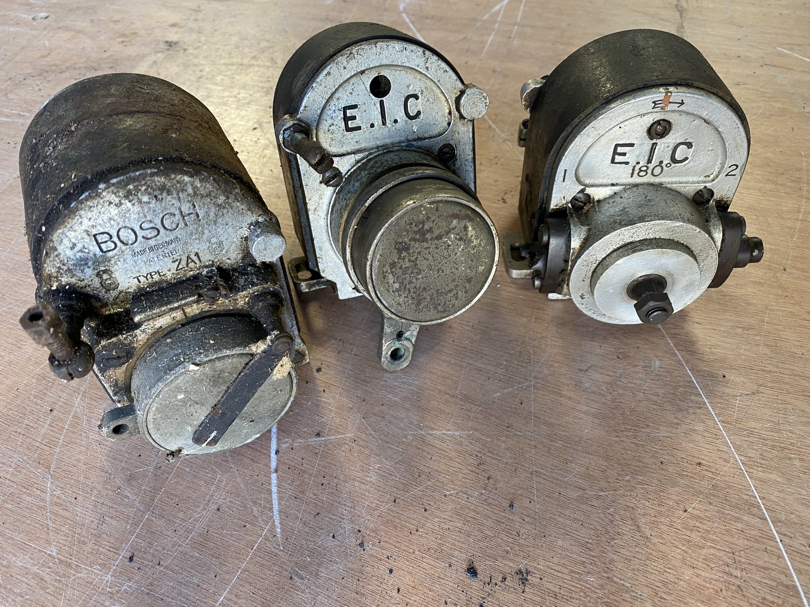 Two early EIC magnetos and a Bosch ZA1 example.