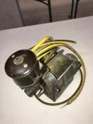 A late 1930s Ariel Square Four distributor and magneto.