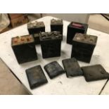 Six old-style batteries, would make ideal battery cases for modern sealed batteries.