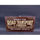 An Agency for Road Transport & General Insurance Company Limited rectangular enamel sign, mounted on