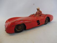 A JNF tin plate model of a 1950s Mercedes racing car.