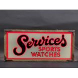 A Services Sports Watches illuminated shop window display sign, 26 3/4" w x 12" h x 8" d.