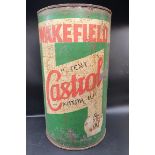 An unusual tall Castrol bulk 12 gallon drum with lid, 14" w x 25" h.