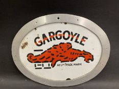 A Gargoyle oval enamel sign, trimmed and framed to mount on the wall, 12 1/2 x 9 1/2".