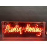 A contemporary neon lightbox advertising Austin Healey, 31 1/2" w x 13 1/4" h x 3" d.