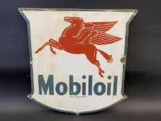 A Mobiloil 'pegasus' enamel sign, dated April 1957, 15 x 15".