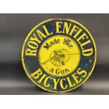 A Royal Enfield Bicycles 'Made like a gun' circular double sided enamel sign by Wildman & Meguyer,