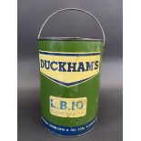 A Duckham's 7lb grease tin, in good condition.