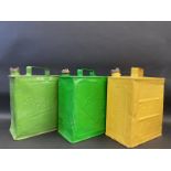 Three 2 gallon petrol cans, comprising Pratts, National Benzole and Power.