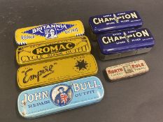 Five puncture repair outfit tins including Romac plus two Champion spark plug tins, new old stock