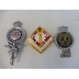 An RAC of South Africa car badge, a J.R. Gaunt London/Scottish badge and one other.