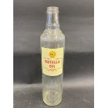A Shell Rotella Oil for Diesels quart glass bottle.