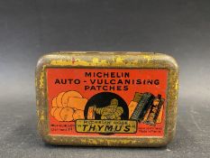A Michelin Auto Vulcanising Patches tin with image of Mr Bibendum to the lid.