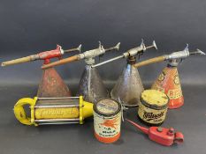 Four Redex conical dispensing guns, a Carburol UCL gun, and two grease tins.