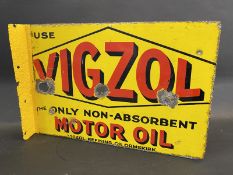A Vigzol Motor Oil double sided enamel sign with hanging flange, bearing the word 'Vigzol Refining