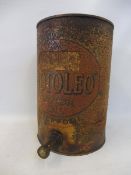 An unusual Motoleo Motor Oil drum with dispensing tap.