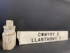 A rectangular cast iron Welsh road sign pointing to Cwmyoy, plus post top, measurement for sign: