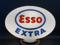 An Esso Extra oval glass petrol pump globe by Hailware, fully stamped underneath 'Property of Esso