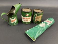 Two Castrolease grease tins, a Castrol half pint measure in good condition dated 1964 and a