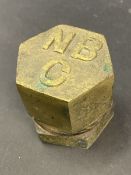 An N.B.C. National Benzole Company brass tank cap lid.