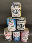 Six reproduction oil cans.
