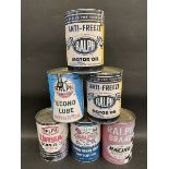Six reproduction oil cans.