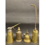 A good quality polished brass oiler stamped 'Suisse' and three others.