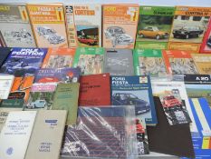 Two boxes of motoring manuals to include B.M.C, Cortina MkIII, Mustang, Anglia etc.
