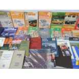 Two boxes of motoring manuals to include B.M.C, Cortina MkIII, Mustang, Anglia etc.