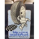 A Michelin pictorial hardboard advertising sign, 30 3/4 x 46 1/4".