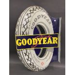 A Goodyear Tyres die-cut double sided enamel sign with hanging flange, heavily restored, 22 x 34".