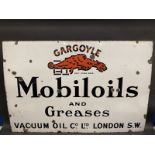 A large Gargoyle Mobiloils and Greases rectangular enamel sign by Patent Enamel, 45 x 30".