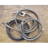 A quantity of rubber petrol pump hoses.