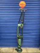 A Gilbarco Model no. T2281 skeleton petrol pump, restored with Shell decals and related attachments,