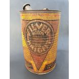 A rare early Silver Knight corrugated oil drum of small proportions, angled spout with cap,