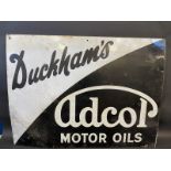 A Duckham's Adcol Motor Oils rectangular enamel sign, by Bruton of Palmers Green, 40 x 30".