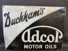 A Duckham's Adcol Motor Oils rectangular enamel sign, by Bruton of Palmers Green, 40 x 30".