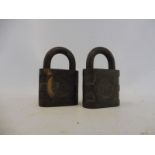 Two Esso branded brass padlocks.