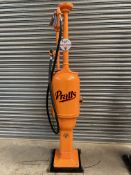 A Gilbarco T8 petrol pump restored in Pratts livery, with rubber hose and nozzle.