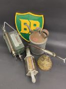A selection of garage cans including a Redex conical dispensing gun, a Mann Egerton oiler etc.