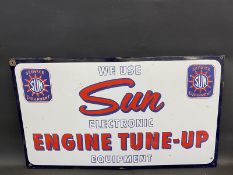 A Sun Electronic Engine Tune Up Equipment rectangular enamel sign, 39 x 22".