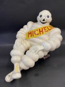 A large Michelin Mr Bibendum figure.