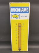 A Duckhams 20-50 Motor Oil enamel thermometer sign by Burnham of London, 13 x 36".