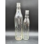 Two early Salvol glass oil bottles.