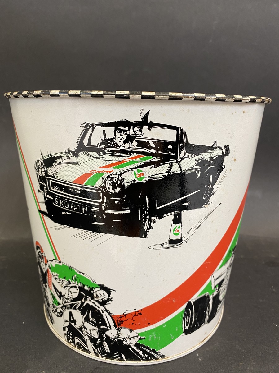 A waste paper bin decorated with various aspects of motor sport, 7" high.