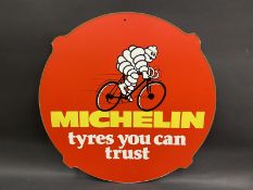 A Michelin 'tyres you can trust' hardboard advertising garage sign, in excellent condition, 25"