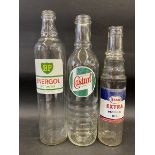 A BP Energol quart oil bottle with excellent label, a Wakefield Castrol quart oil bottle and an Esso