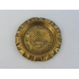 A Snowdrift Lubricant 'Snowdon Sons & Co. Ltd' brass ashtray.