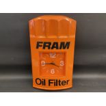 A Fram Oil Filter garage showroom advertising wall clock, 15 1/2 x 24".